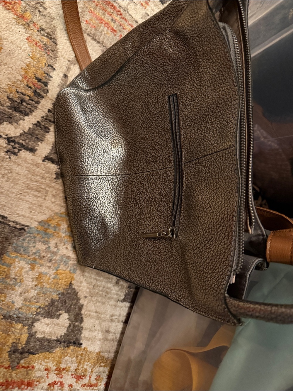 The Sak Black Pebbled Crossbody with Brown Strap